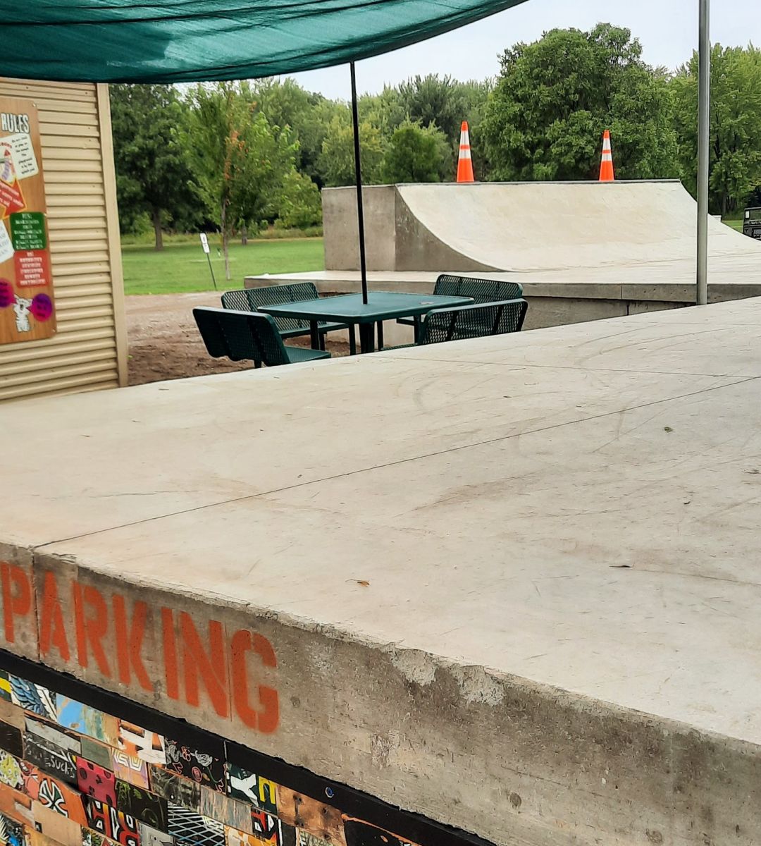 Skateboard ramp; chairs and table